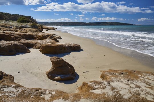 Vulcanic Beach, a peaceful stretch of beach with rocks and gentle waves, Kos, Dodecanese, Greek Islands, Greece