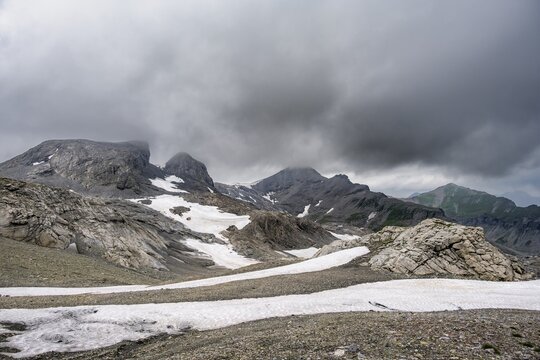 Bare rocky mountain landscape with remnants of snow in bad weather, Rote H&auml;rd, Bernese Alps, Bernese Oberland, Switzerland