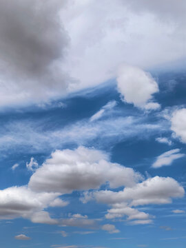 Textured Cloudscape with Blue Sky and White Clouds
