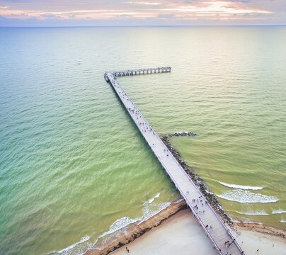 Palanga main bridge from above with tourists and baltic sea aves crashin.Holidays in baltics. Palanga. Lithuania