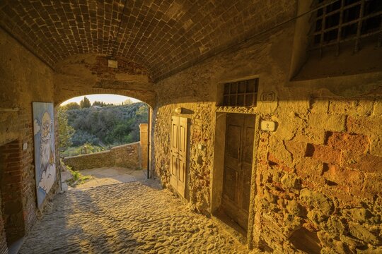 Side alleyway in the old town at dusk, Vinci, Metropolitan City of Florence, Italy
