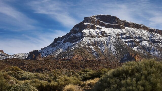 Near Ermita de las Nieves, snowy mountain with rocks under wide blue sky, Teide, Parque Nacional del Teide, Teide National Park, volcano, volcanism, UNESCO World Heritage Site, Tenerife, Canary Islands, Spain