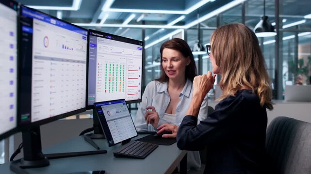 Young Woman Checks IT Asset Security And Compliance