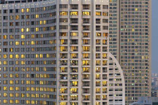 Nocturnal view of the Shangri-La Hotel on the east bank of Chao Phraya, the warmly lit rooms stand out clearly against the dense high-rise backdrop of the Riverside Zone, Bang Rak district, Bangkok, Thailand
