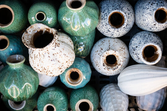 Assorted handmade ceramic vases pattern viewed from above