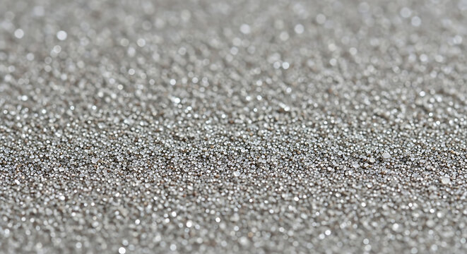 Silver metallic granules close up texture with shallow depth of field