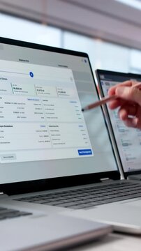 Mature Woman Is Checking Payroll Details