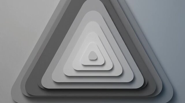 Abstract 3D motion graphic showing gray layered triangles pulsing and scaling on a light background.