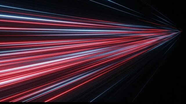 High speed red and blue light trails zooming toward vanishing point.