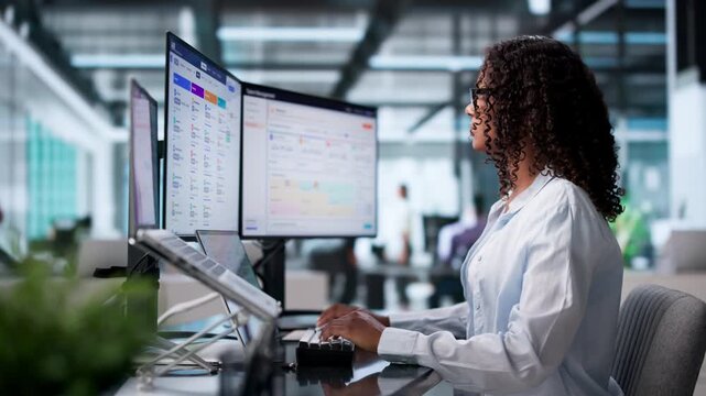 Human Resources Manager Carefully Reviews Candidate Resumes During Hiring