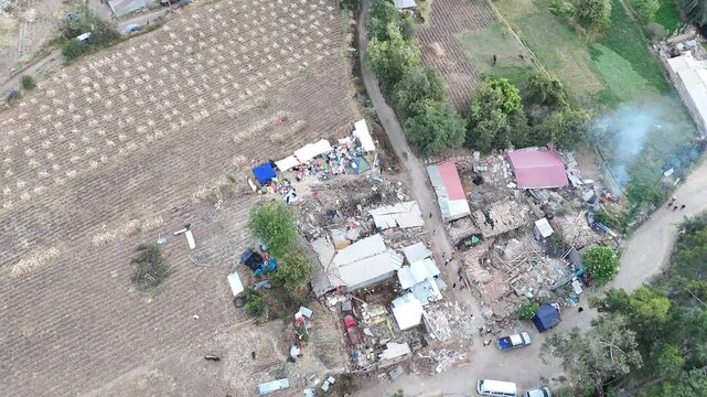 4K Aerial Drone: Destroyed adobe house after an earthquake in Pumpunya, Chongos Alto, Huancayo. Structural collapse in rural Andes, Peru.