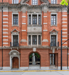 Obraz premium Exterior view of the historical red brick Former Daqing Bank Building, dated 1908, located on Hankou Road in Shanghai, China