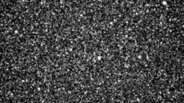 Black and white textured fabric with small white spots and sequins seamless pattern