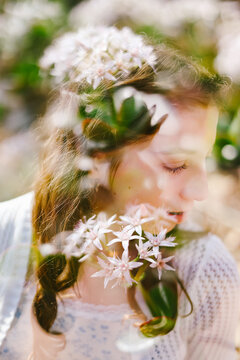 Dreamy double exposure portrait of young woman