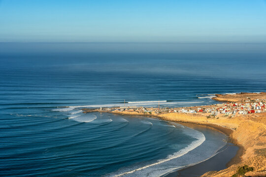 Imsouane coastline village with ocean waves rolling in Morocco