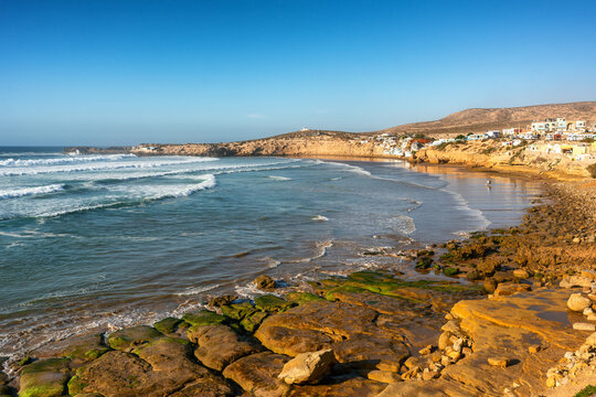 Imsouane coastal village with ocean waves at sunrise in Morocco