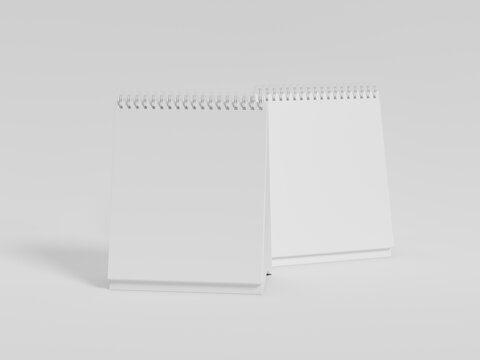 3D Render Blank Square Desk Calendar Mockup. White Spiral Square Table Calendar Mockup 3D Render
