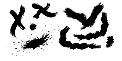 Abstract ink brush strokes creating expressive dark shapes on a clean surface area © Stockphoto