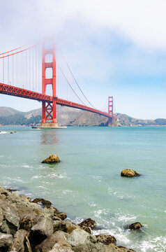 Morning fog lifting over Golden Gate Bridge