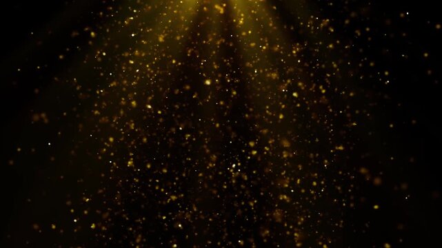 4K Gold Particles Loop Video Effect.Glowing golden dust and light rays on black background. Seamless luxury overlay.