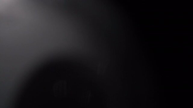 Vintage leaks translucent lens flare with subtle smoky optical diffusion atmosphere