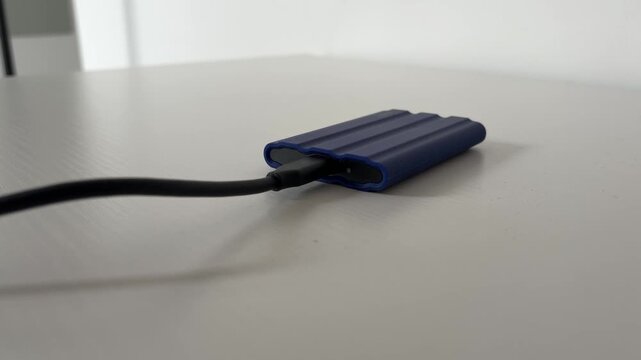 External SSD Connected to Computer for Backup and File Storage