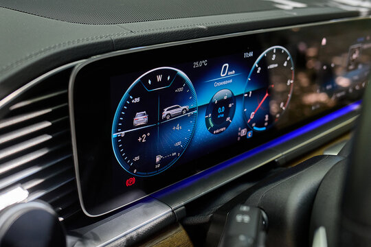 Digital car dashboard display with speedometer and controls