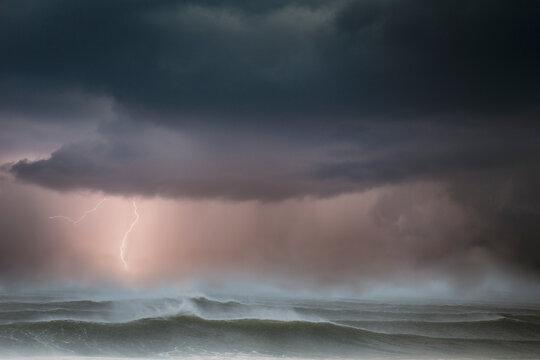 Storm at rough sea at dusk