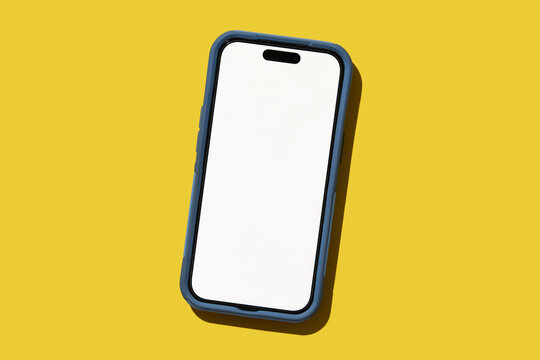 Blank smart phone on yellow background