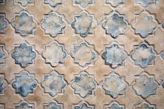 Close-up of beige and blue tile
