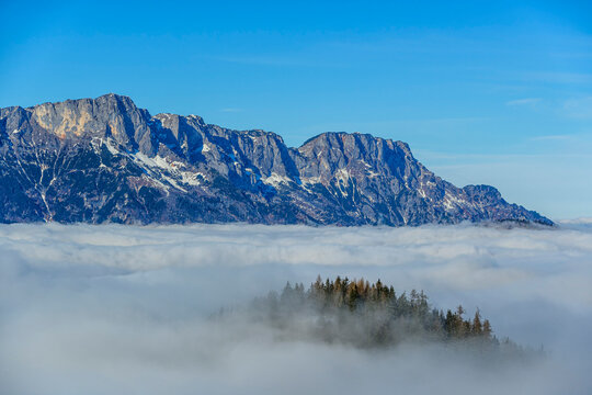 Untersberg mountain above fog in Berchtesgaden Alps Germany