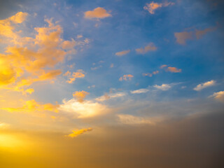 Fototapeta premium Sky sunset evening sunrise cloud weather dramatic landscape goldent and indigo color gradient pastel horizon, twilight yellow golden reflection morning nature environment energy ecosystem change