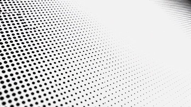 Abstract halftone dot pattern background. Monochrome gradient texture with circular shapes.