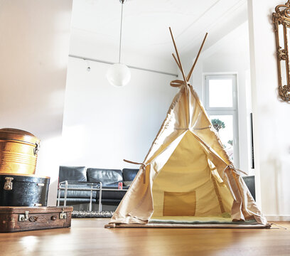 Teepee on floor in living room