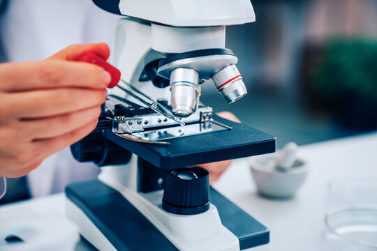 Scientist or researchers working in science laboratory, medical technology research work, science laboratory research and development concept.