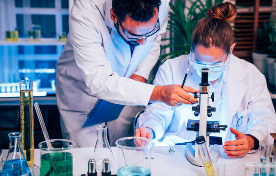 Scientist or researchers working in science laboratory, medical technology research work, science laboratory research and development concept.