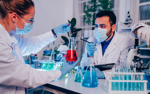 Scientist or researchers working in science laboratory, medical technology research work, science laboratory research and development concept.