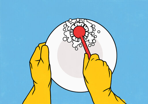 Personal perspective view from above of hands in rubber gloves doing dishes, washing a plate