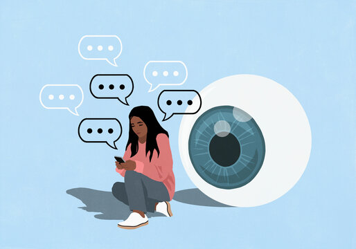Large eyeball watching woman text messaging on smart phone against blue background