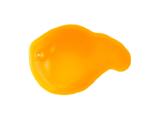 Spilled orange juice isolated, mango smoothie puddle, liquid stain, carrot juice splatter