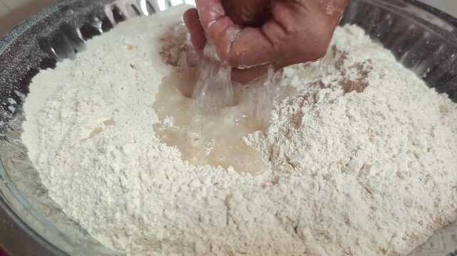 Kneading Dough by Hand - Indian Woman Preparing Wheat Flour Dough for Chapati in Plate