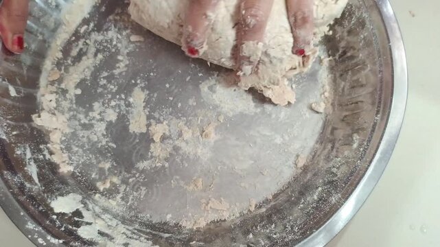 Kneading Dough by Hand - Indian Woman Preparing Wheat Flour Dough for Chapati in Plate
