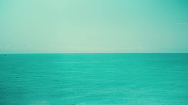 Ocean Summer seen from the window of a high speed train traveling in Italy