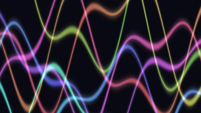 Colorful wave patterns in motion on dark background