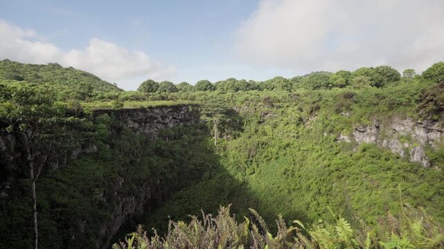 Scenic view of los gemelos, twin sinkholes in the highlands of santa cruz island, galapagos