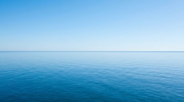 Vast Blue Ocean Horizon Under Clear Sky.