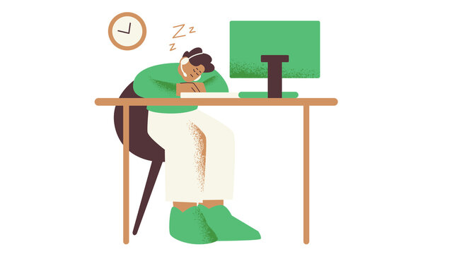 Exhausted employee sleeping at desk in front of computer during late work hours