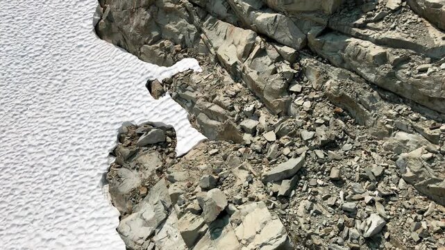 Whistler Rocks from the chairlift, Blackcomb mountain in British Columbia on a sunny summer day. Slow motion