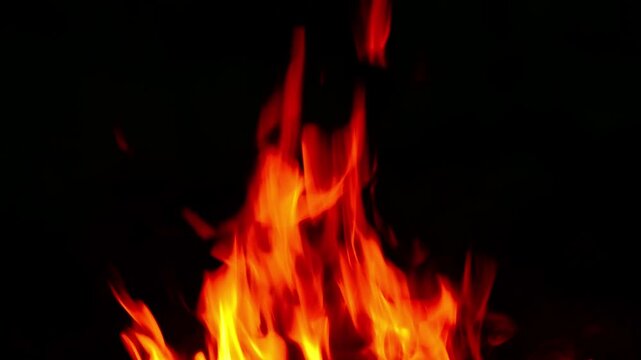 Seamless Loop of Bright Fire Flames on Black Background with Crackling Sound, Close Up Night Campfire, Burning Firewood ASMR, Flame Animation Alpha Layer Background Footage.