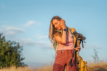 Fototapeta premium Woman hiking in nature enjoying outdoor activity and healthy lifestyle